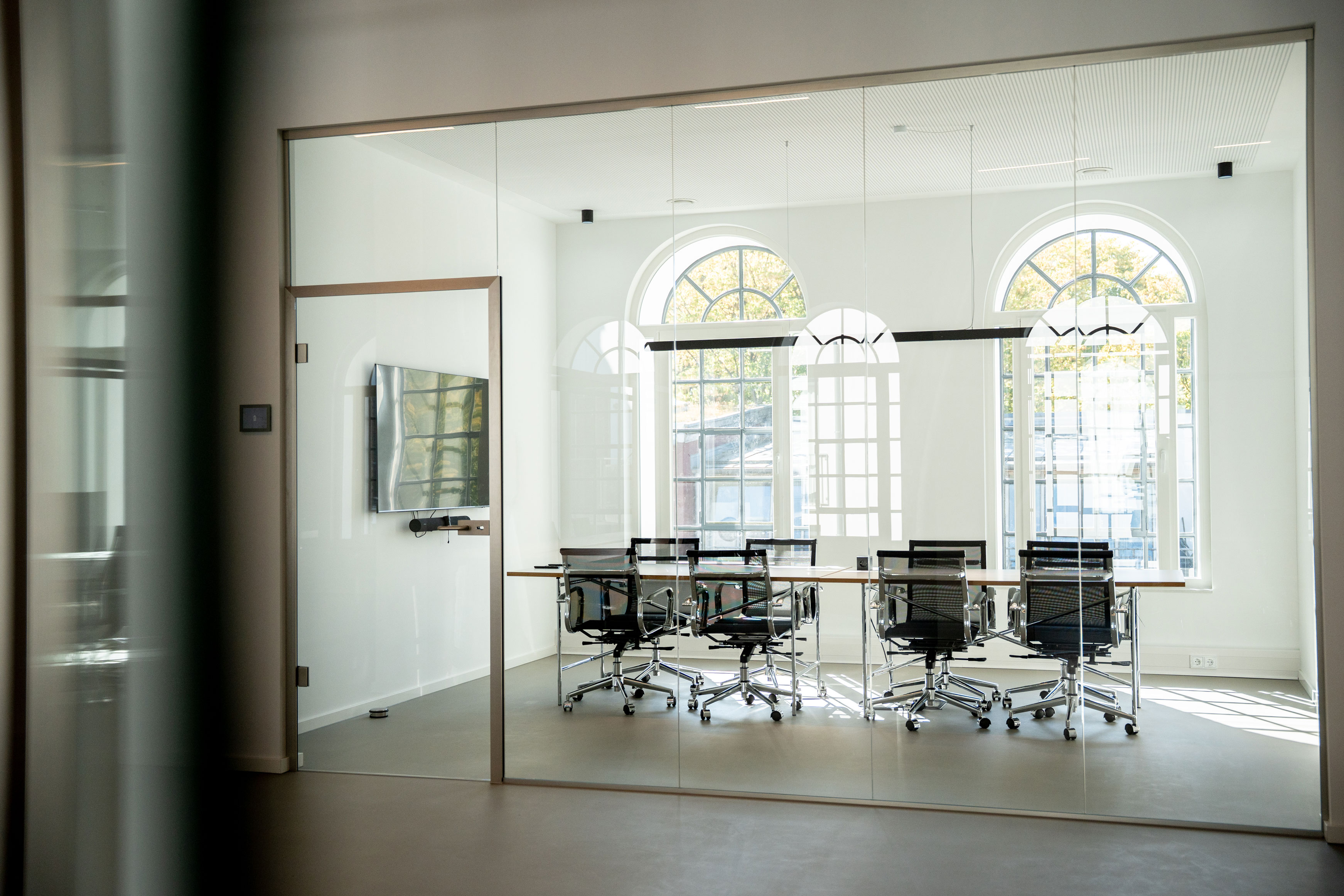 People working at desks in an open office